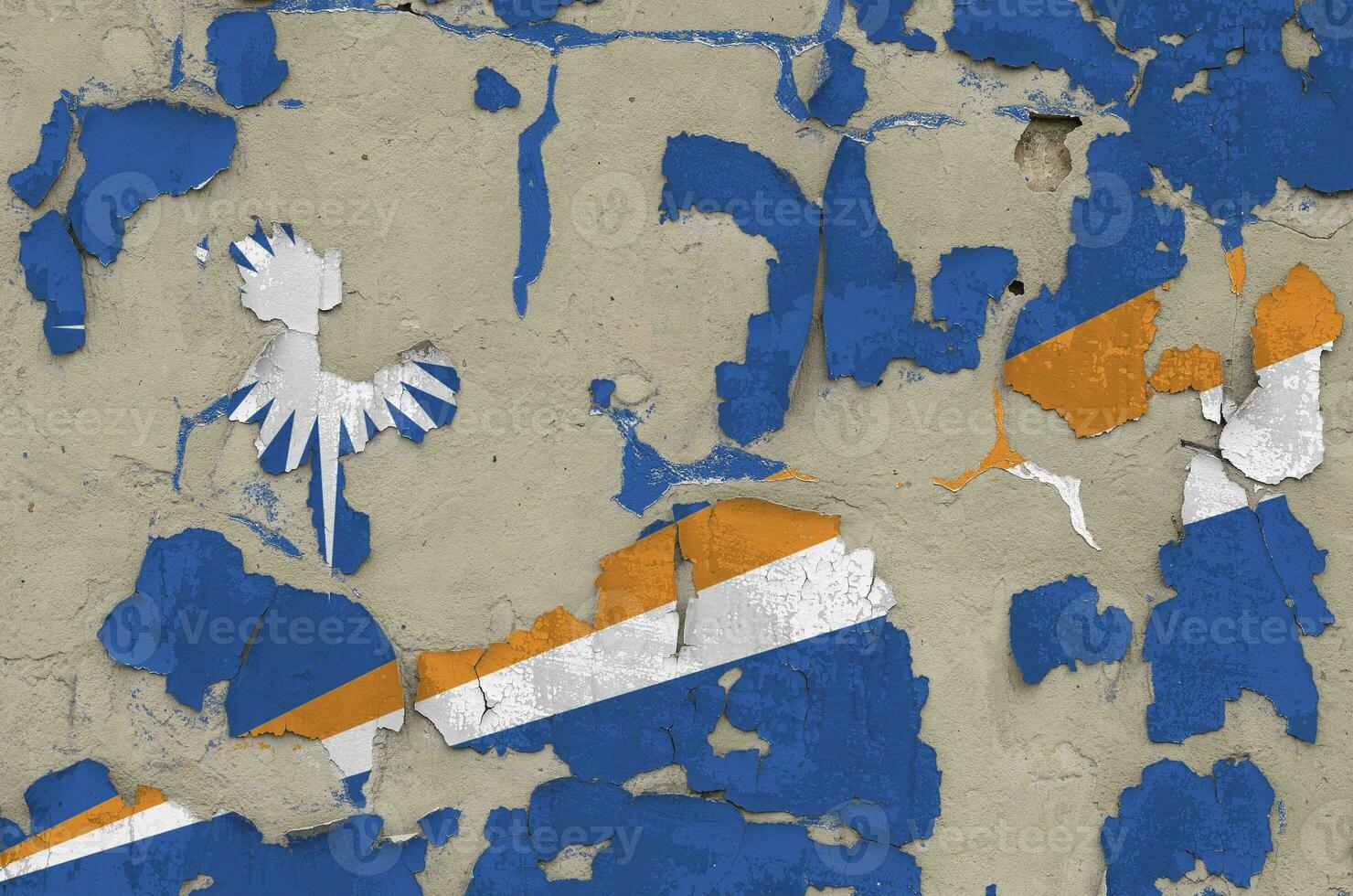 Marshall Islands flag depicted in paint colors on old obsolete messy concrete wall closeup. Textured banner on rough background photo