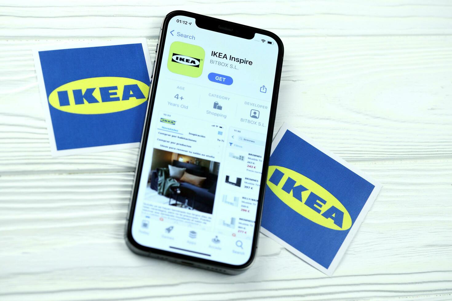KHARKOV, UKRAINE - MARCH 5, 2021 Ikea icon and application from App store on iPhone 12 pro display screen on white table photo