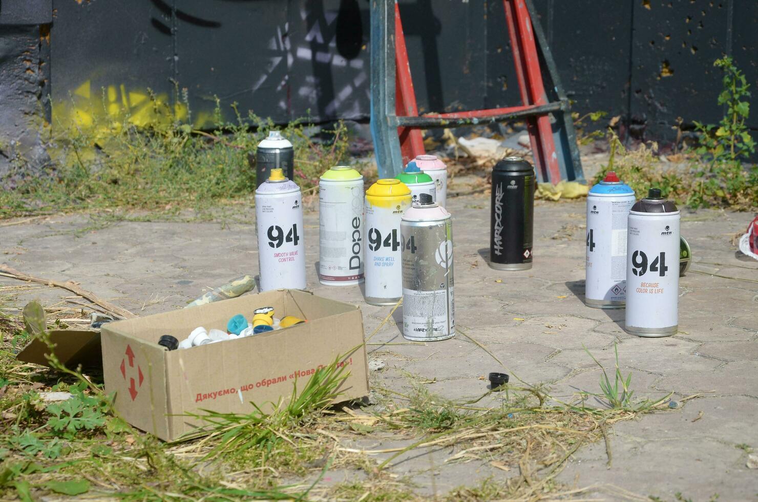Montana mtn 94 and hardcore used spray cans for graffiti painting outdoors and caps box photo