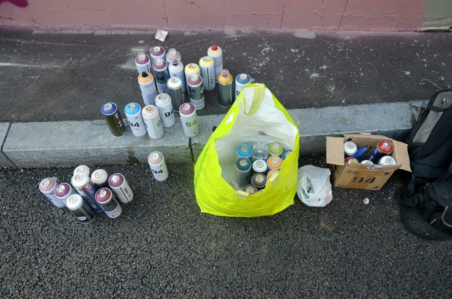 Montana mtn 94 and Kobra used spray cans for graffiti painting outdoors photo