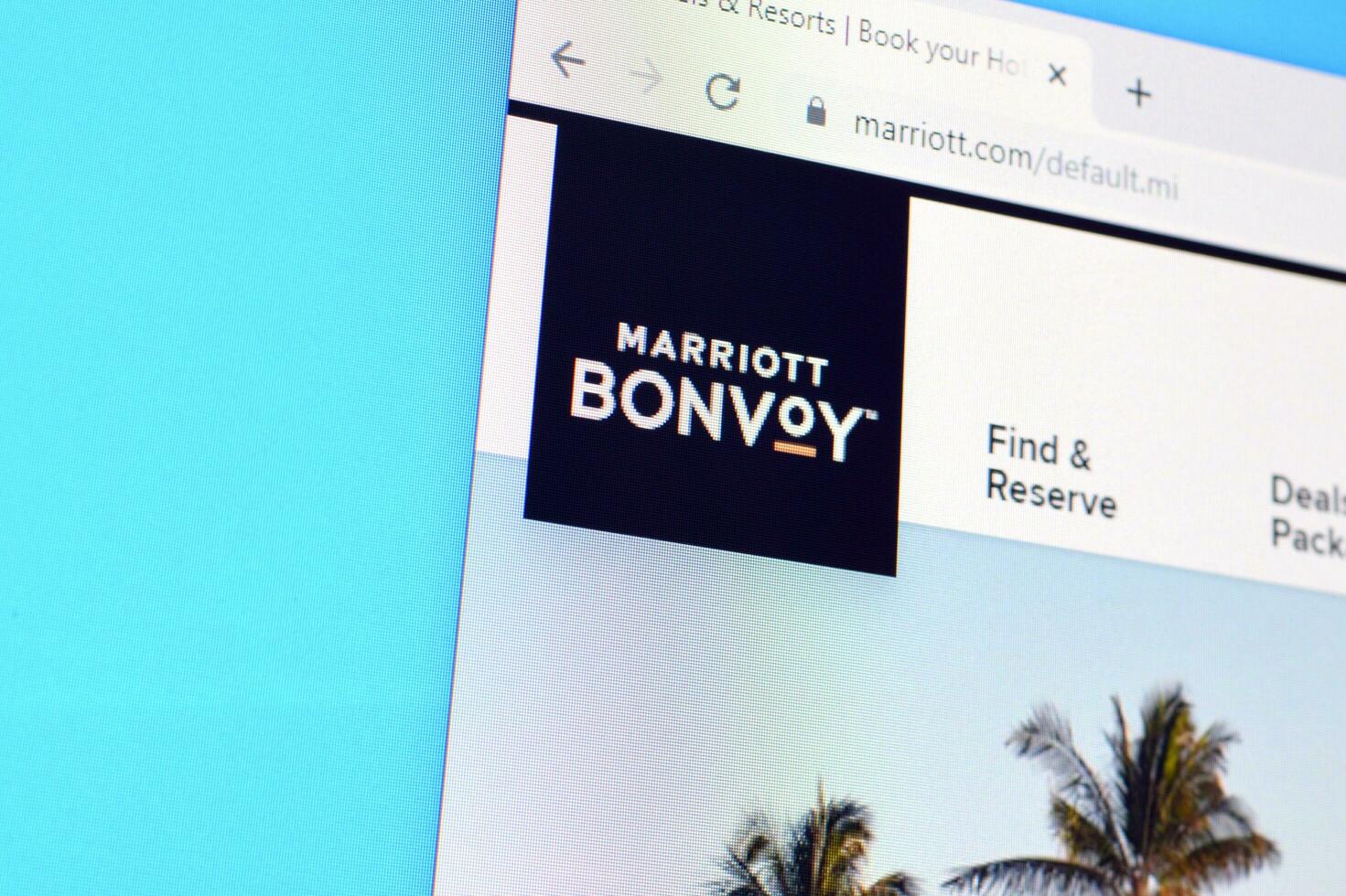 Homepage of marriot bonvoy website on the display of PC, url - marriott.com. photo