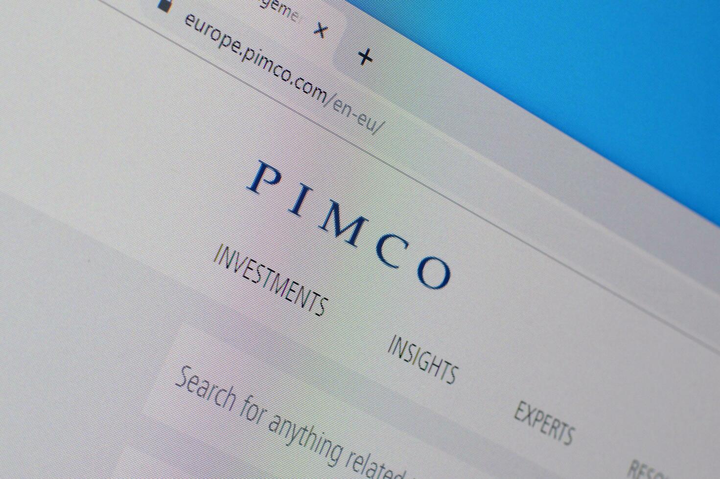 Homepage of pimco website on the display of PC, url - pimco.com. photo