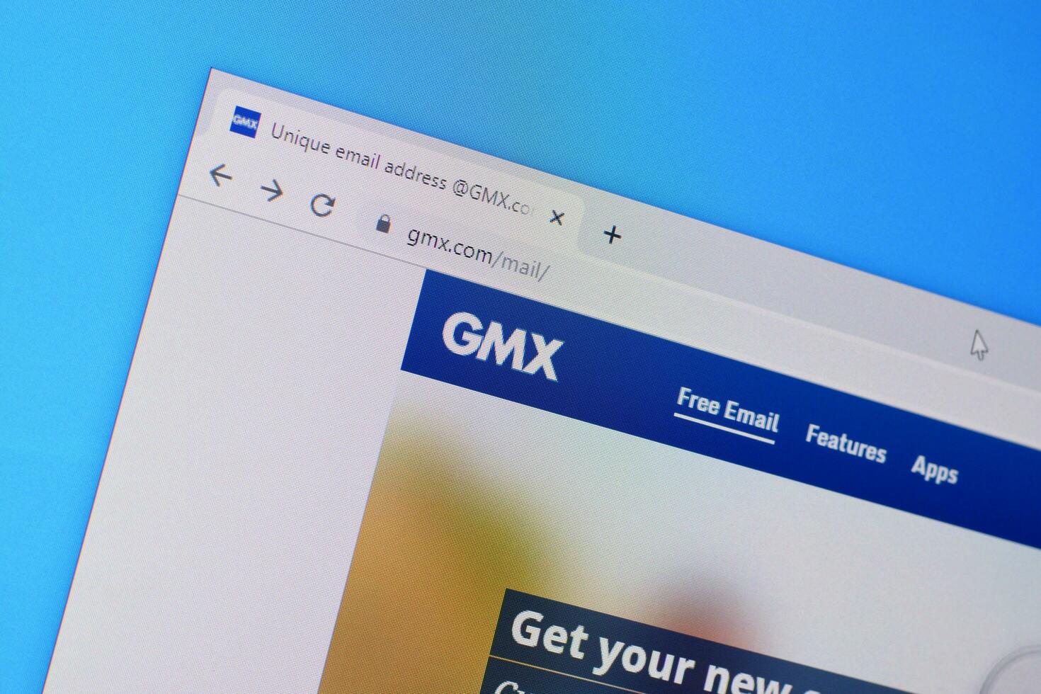 Homepage of gmx mail website on the display of PC, url - gmx.com. photo