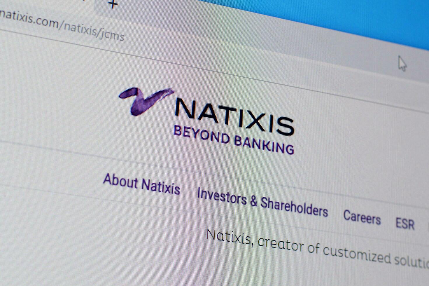 Homepage of natixis website on the display of PC, url - natixis.com. photo