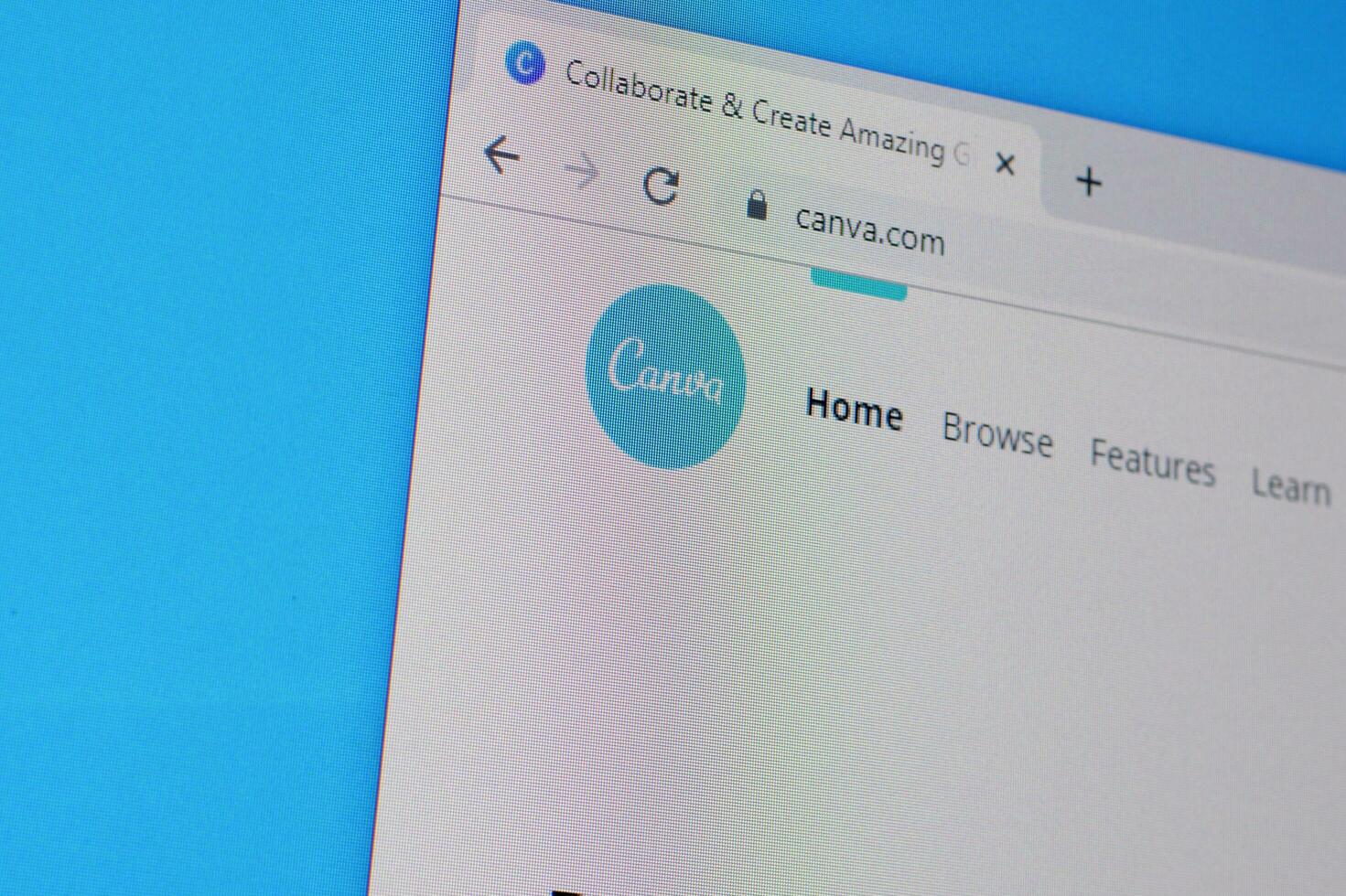Homepage of canva website on the display of PC, url - canva.com. photo