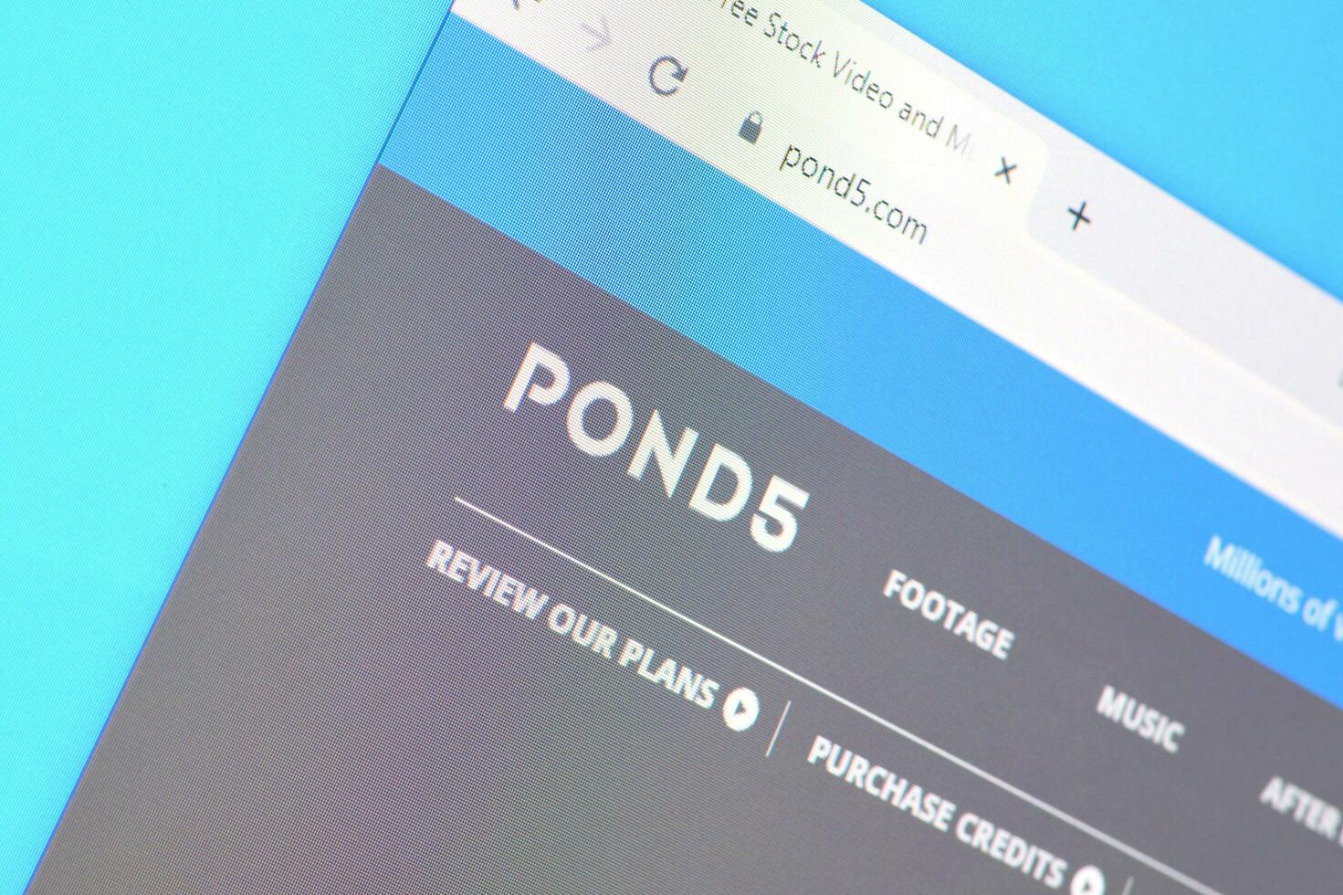 Homepage of pond5 website on the display of PC, url - pond5.com. photo