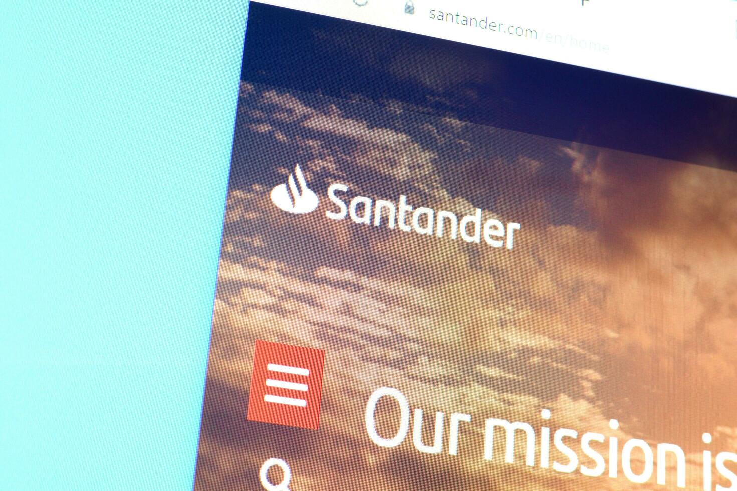 Homepage of santander website on the display of PC, url - santander.com. photo