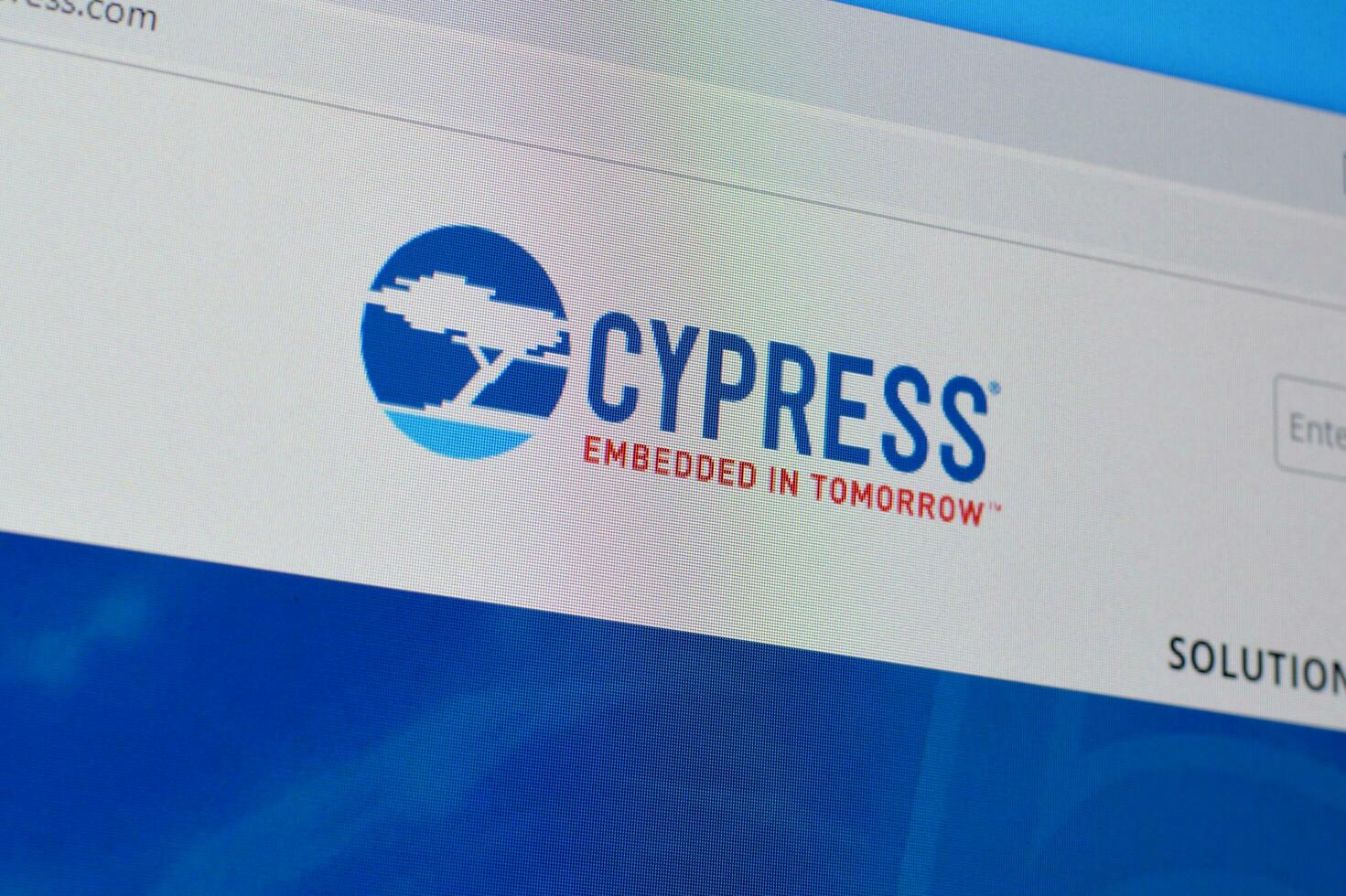 Homepage of cypress website on the display of PC, url - cypress.com. photo
