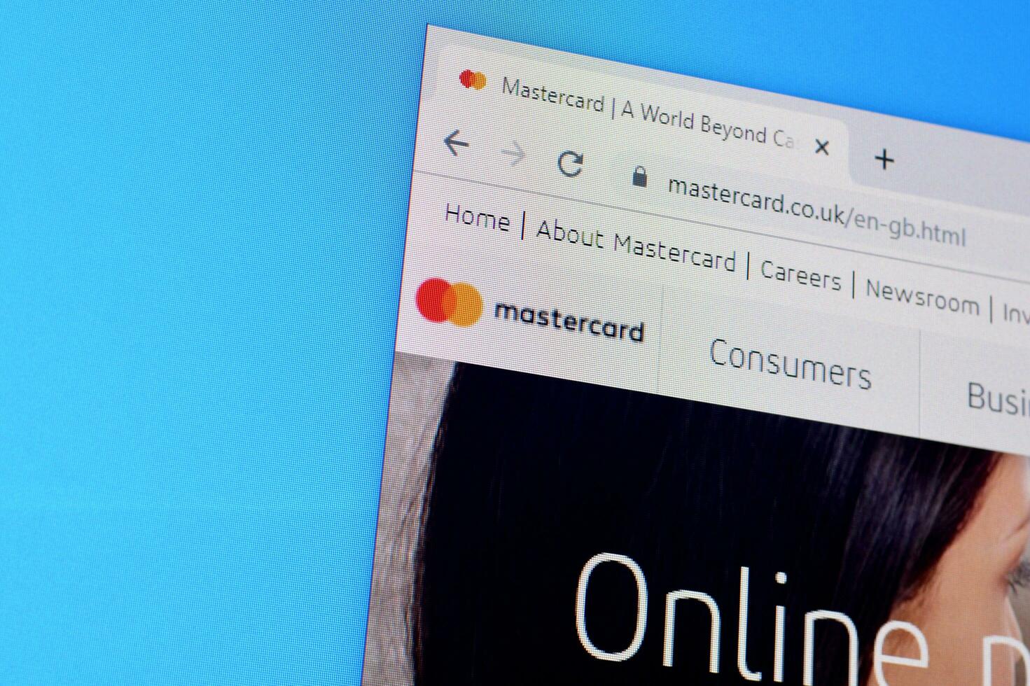 Homepage of mastercard website on the display of PC, url - mastercard.com. photo