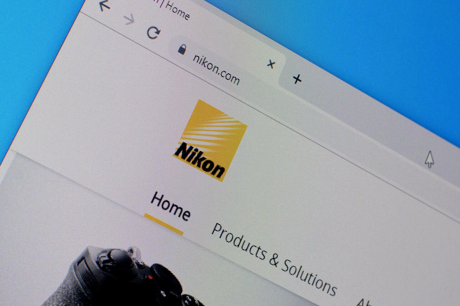 Homepage of nikon website on the display of PC, url - nikon.com. photo