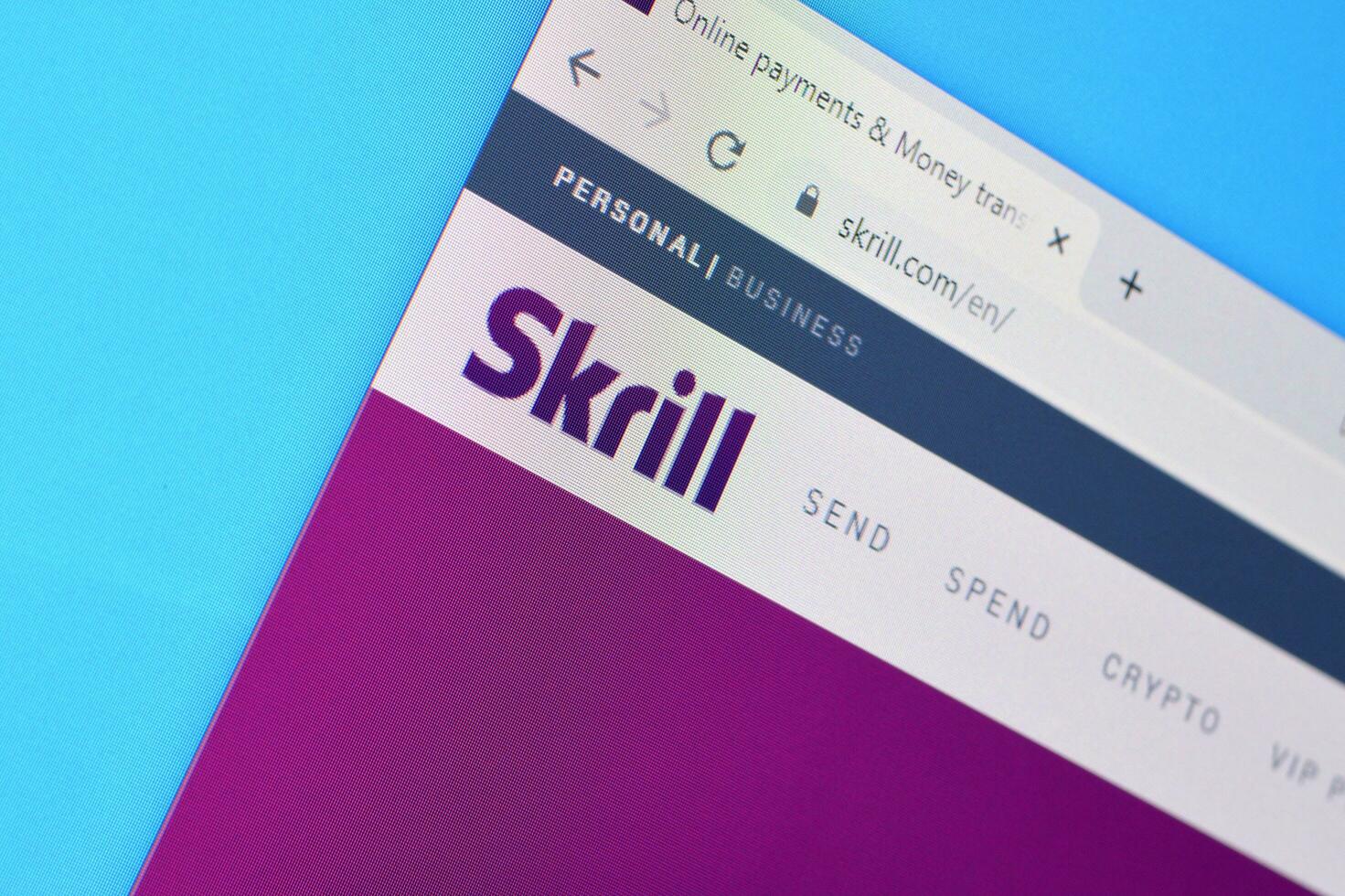 Homepage of skrill website on the display of PC, url - skrill.com. photo