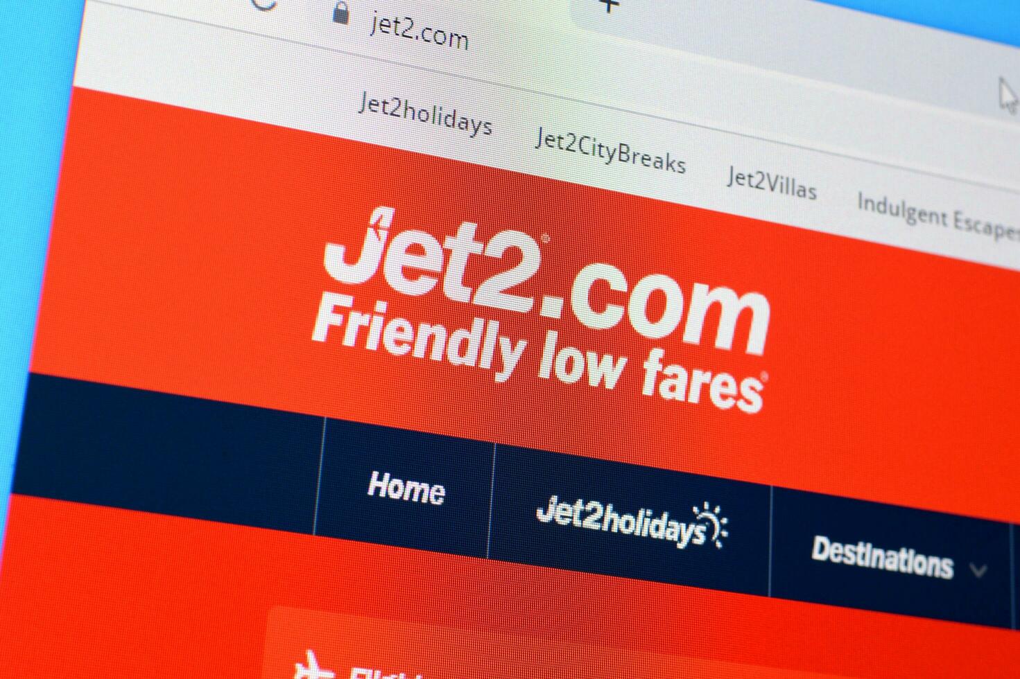 Homepage of jet2 website on the display of PC, url - jet2.com. photo