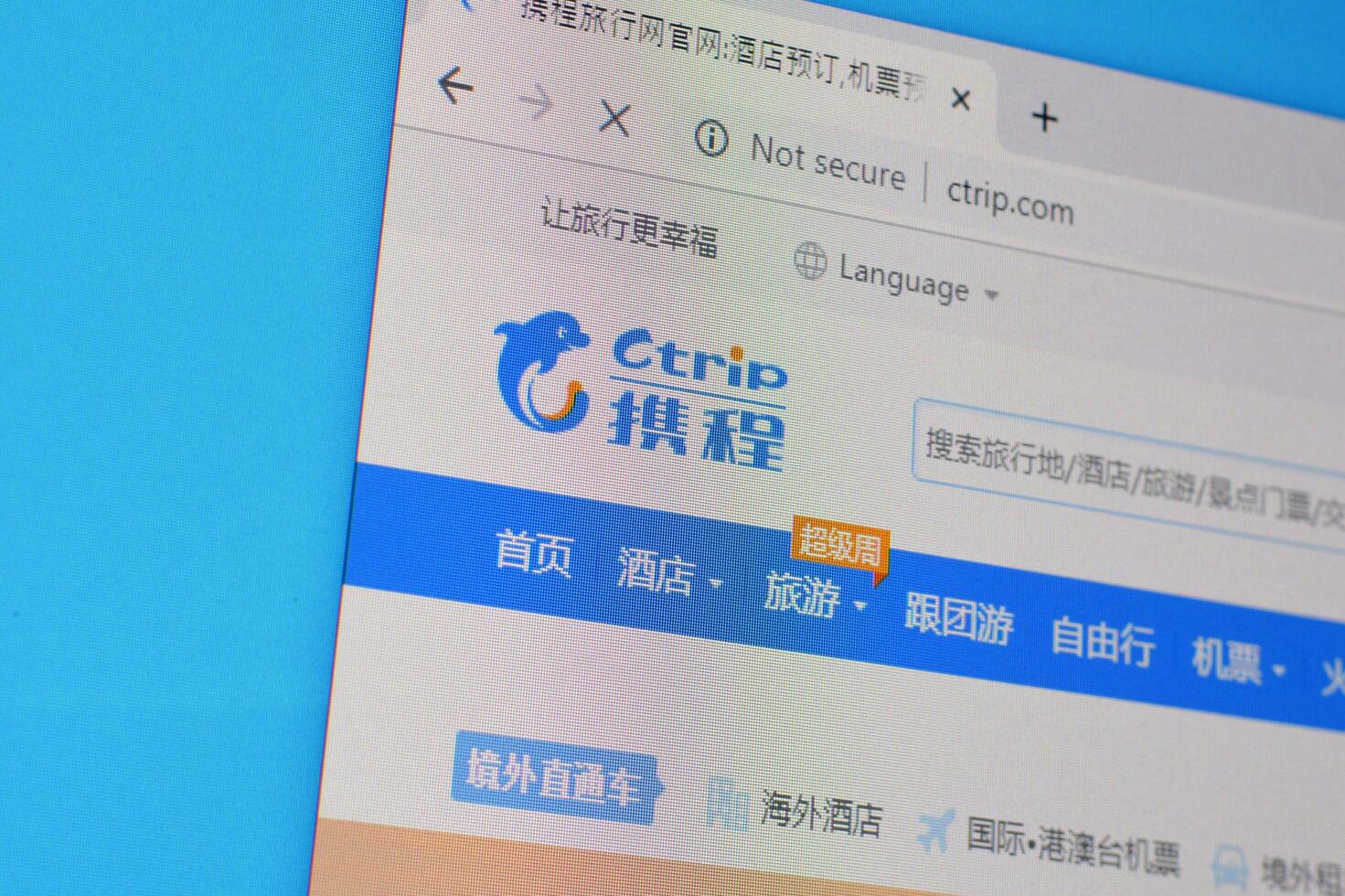 Homepage of ctrip website on the display of PC, url - ctrip.com. photo