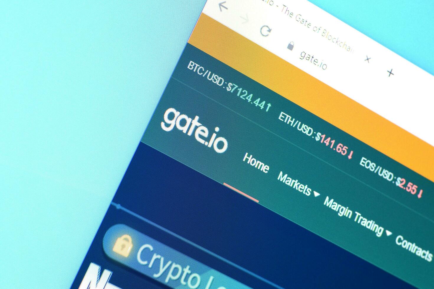 Homepage of gateio website on the display of PC, url - gate.io. photo