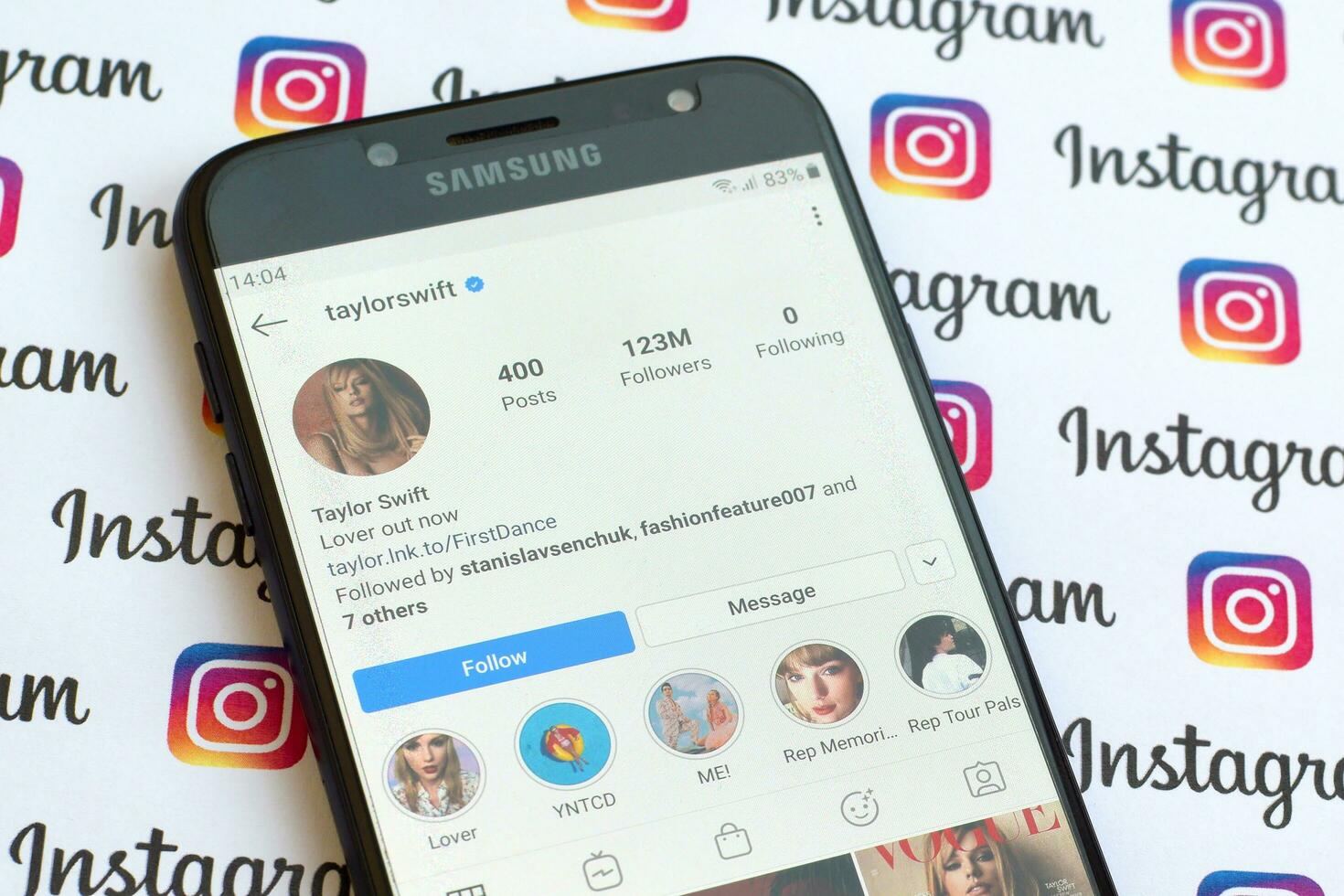 Taylor Swift official instagram account on smartphone screen on paper instagram banner. photo