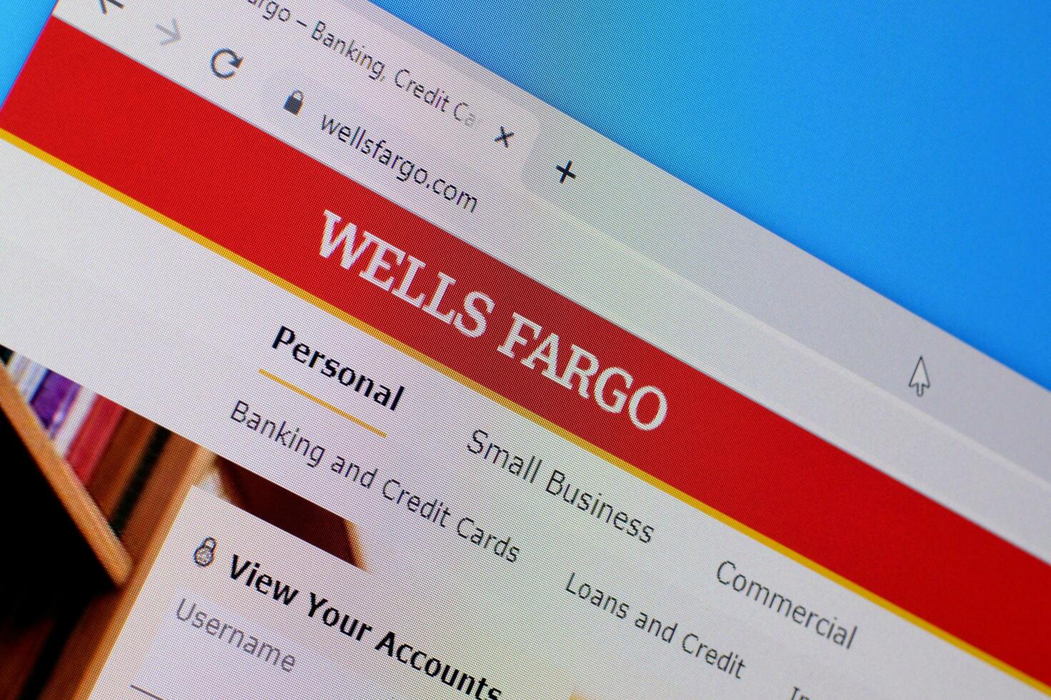Homepage of wells fargo website on the display of PC, url - wellsfargo.com. photo