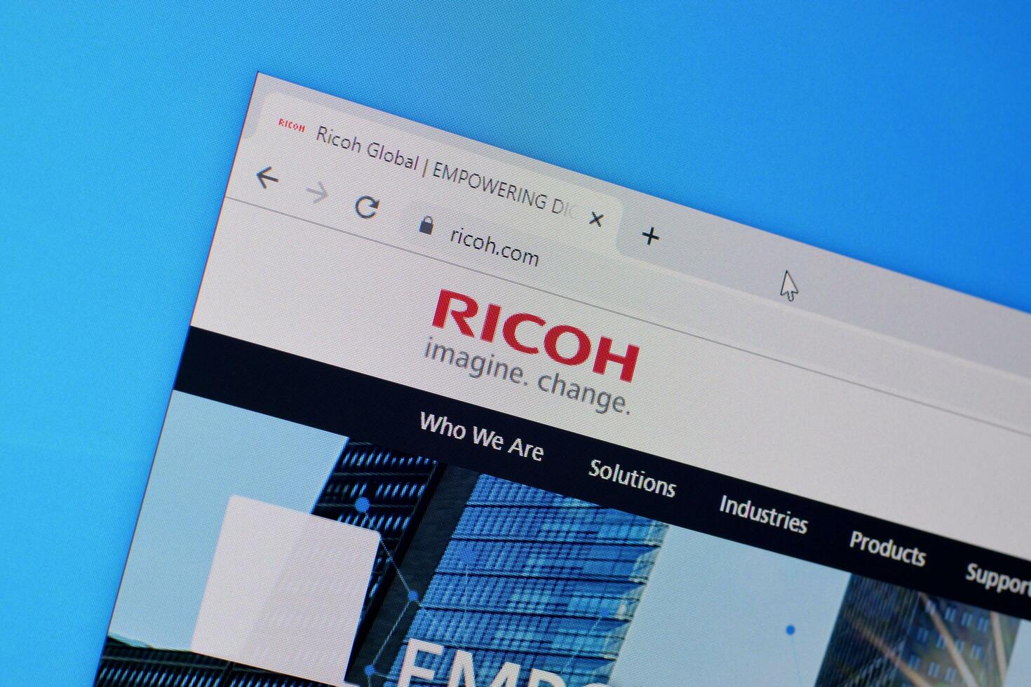 Homepage of ricoh website on the display of PC, url - ricoh.com. photo