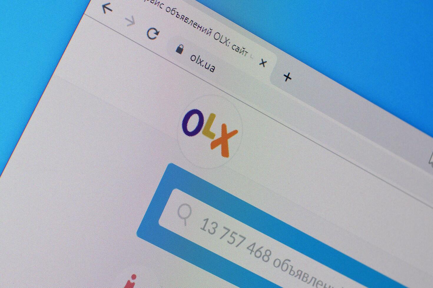 Homepage of olx website on the display of PC, url - olx.ua. photo