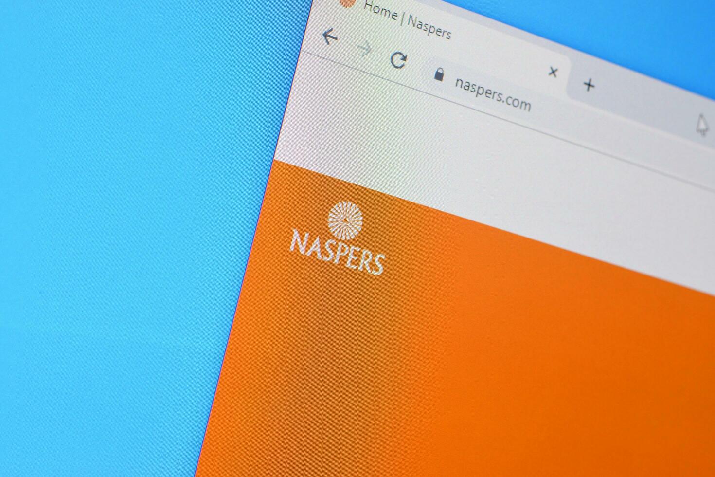 Homepage of naspers website on the display of PC, url - naspers.com. photo