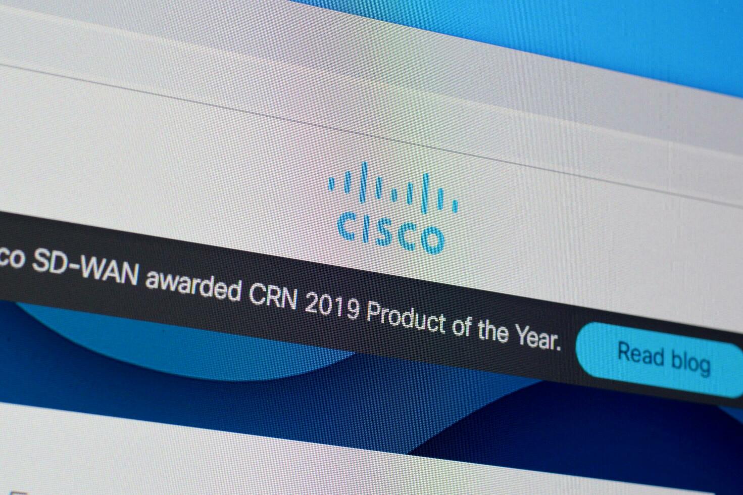 Homepage of cisco website on the display of PC, url - cisco.com. photo