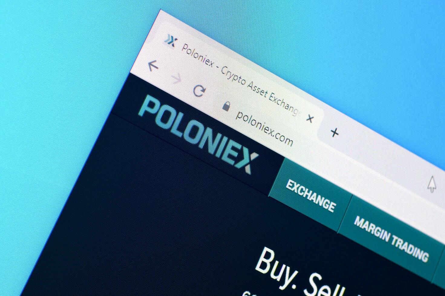 Homepage of poloniex website on the display of PC, url - poloniex.com. photo
