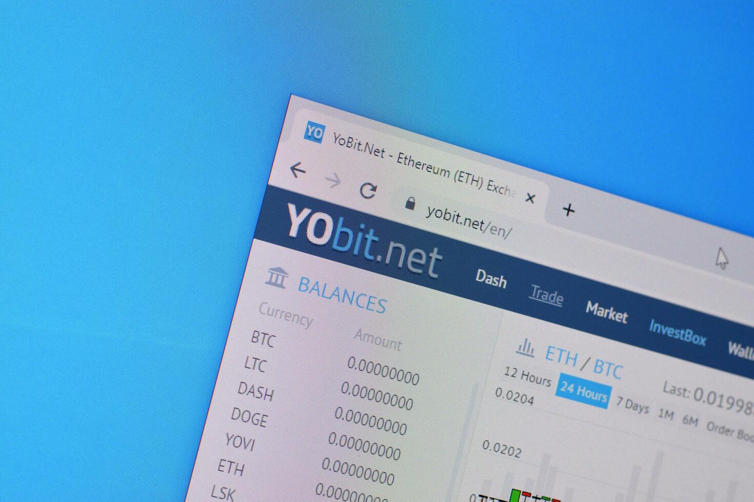 Homepage of yobit website on the display of PC, url - yobit.net. photo