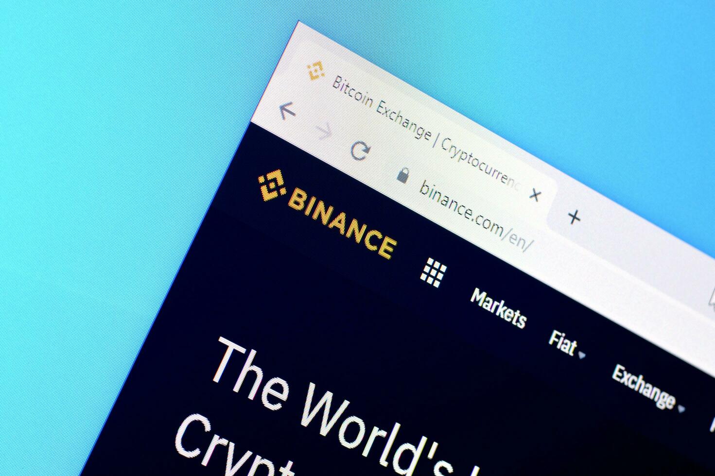 Homepage of binance website on the display of PC, url - binance.com. photo