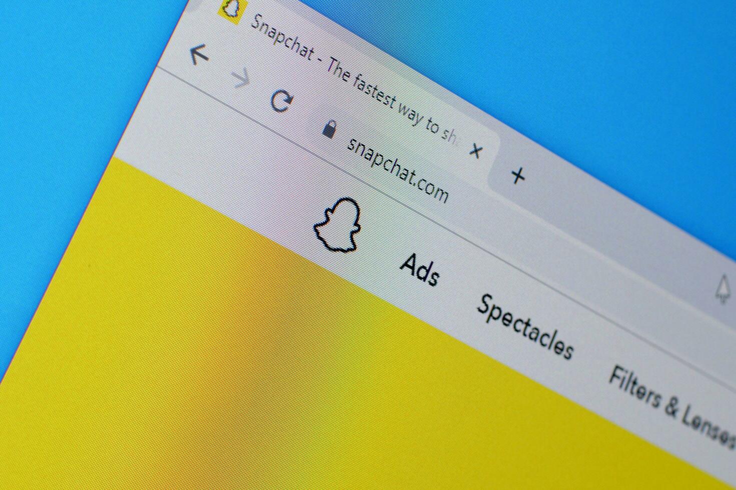 Homepage of snapchat website on the display of PC, url - snapchat.com. photo