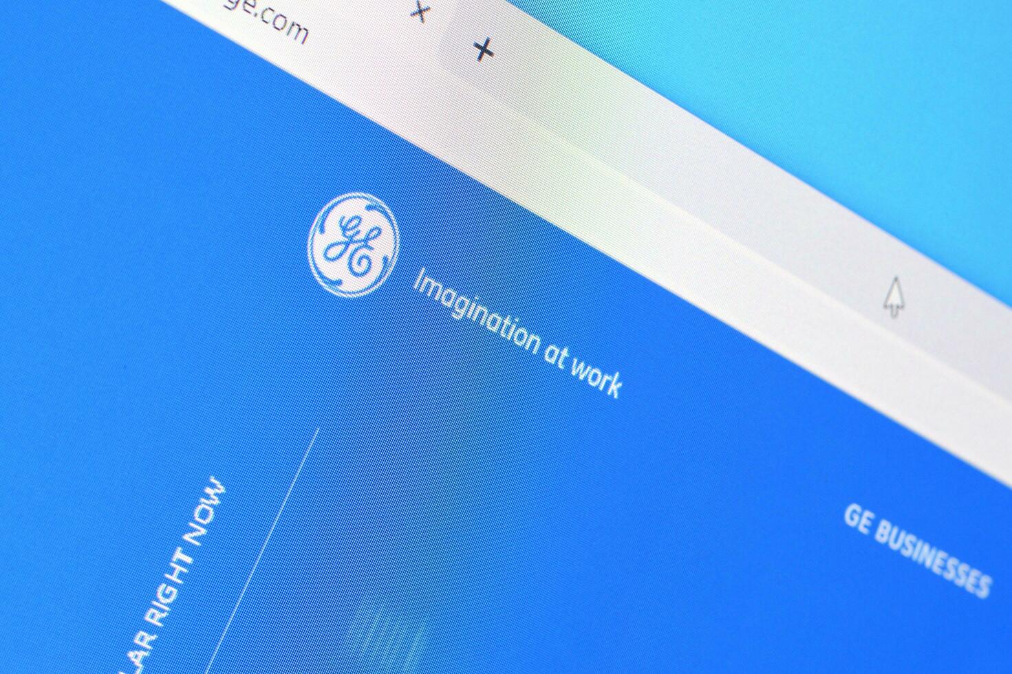Homepage of ge t and d website on the display of PC, url - ge.com. photo
