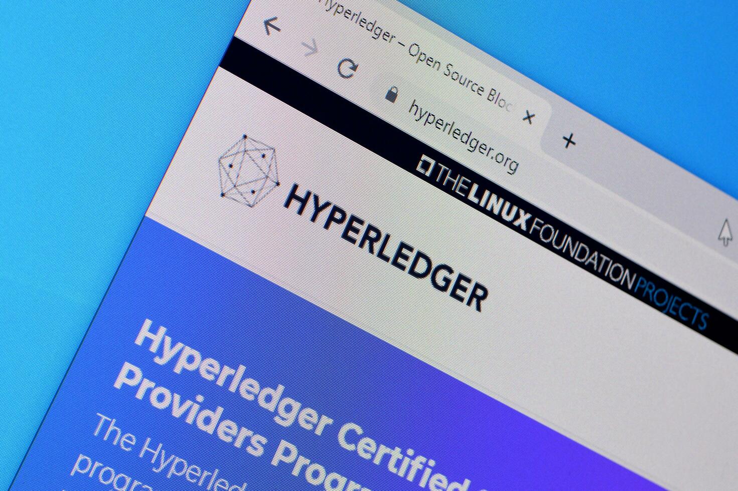 Homepage of hyper ledger website on the display of PC, url - hyperledger.org. photo