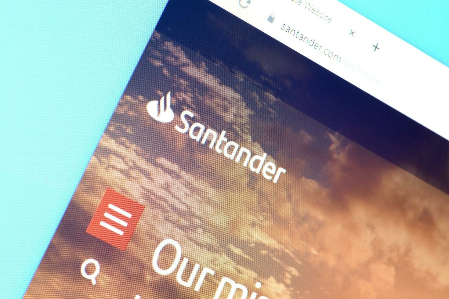 Homepage of santander website on the display of PC, url - santander.com. photo