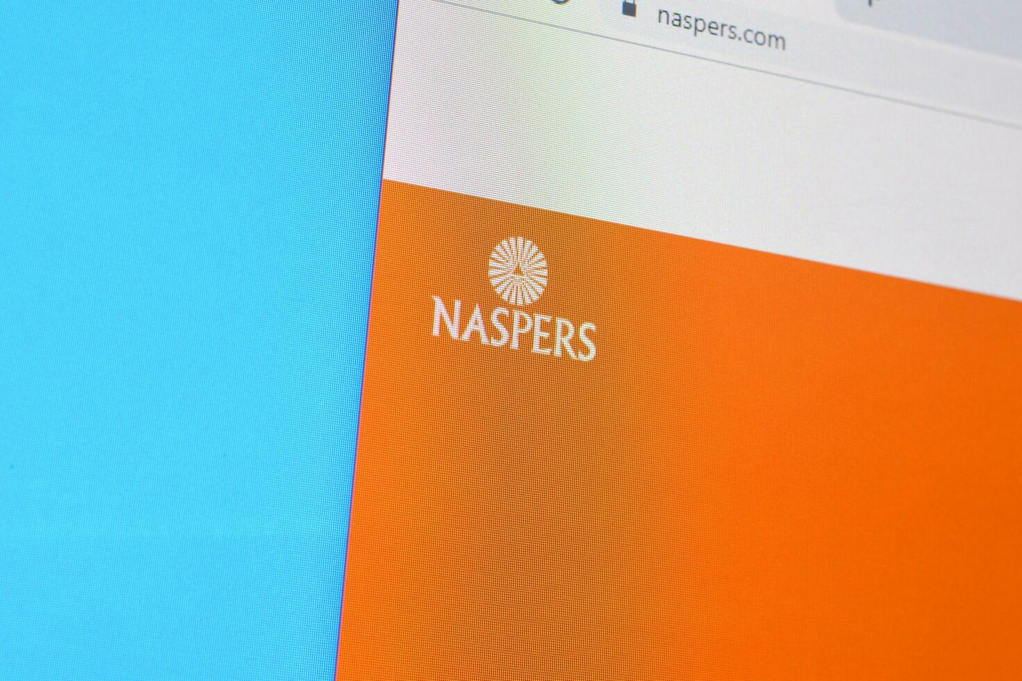 Homepage of naspers website on the display of PC, url - naspers.com. photo