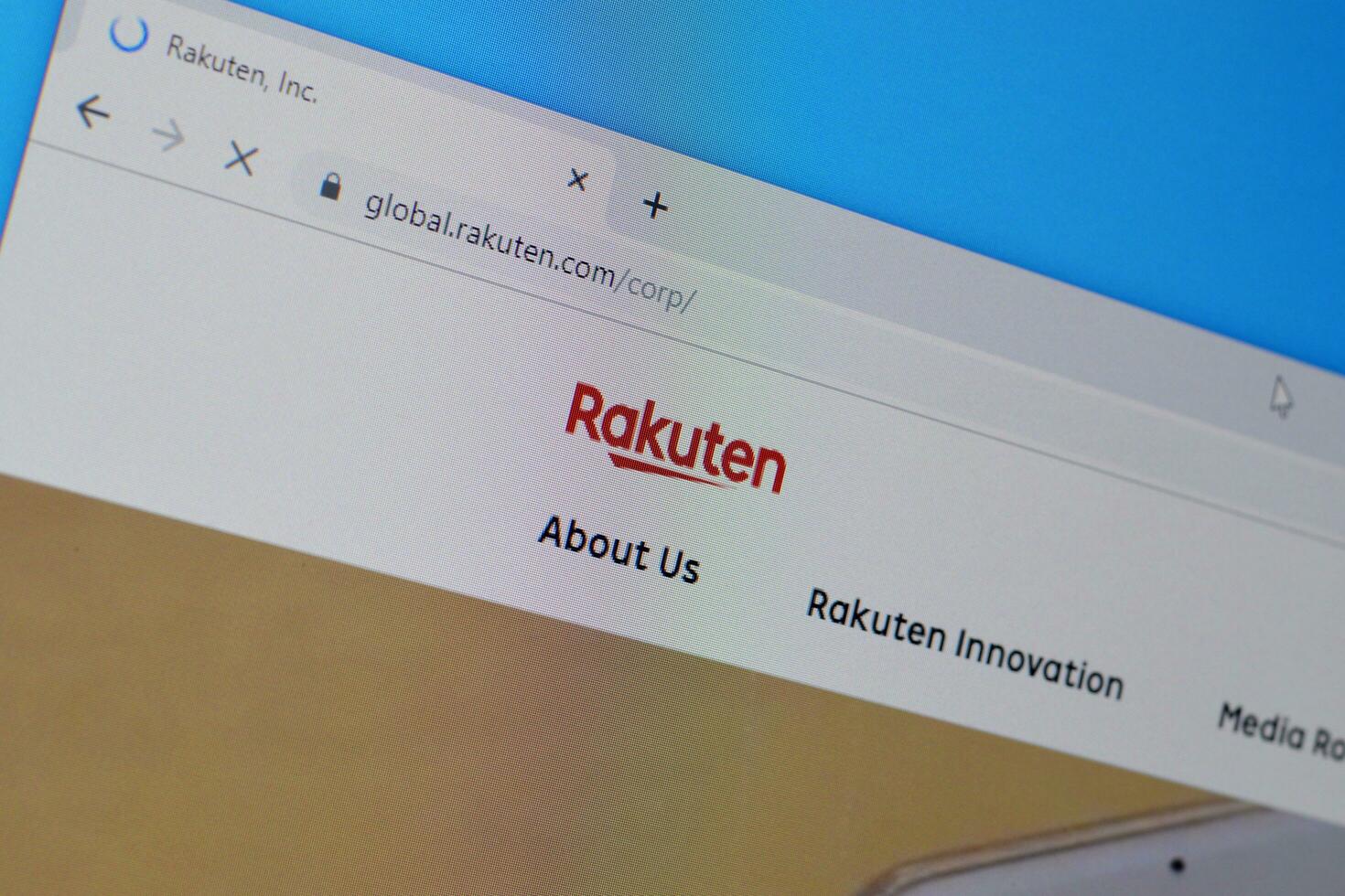 Homepage of rakuten website on the display of PC, url - global.rakuten.com. photo