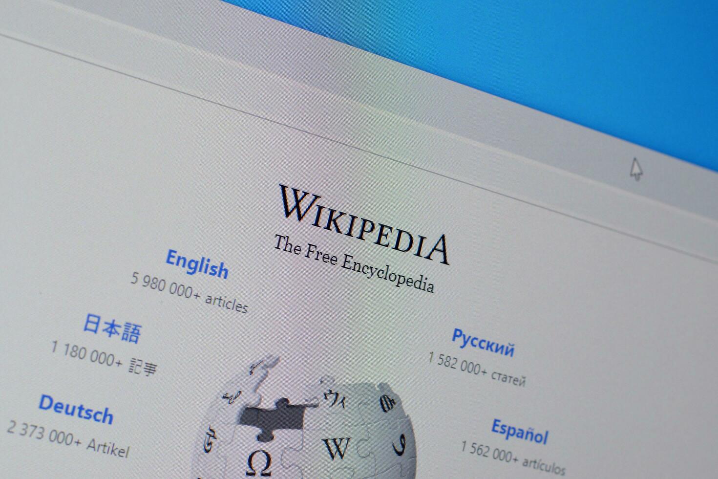 Homepage of wikipedia website on the display of PC, url - wikipedia.org. photo