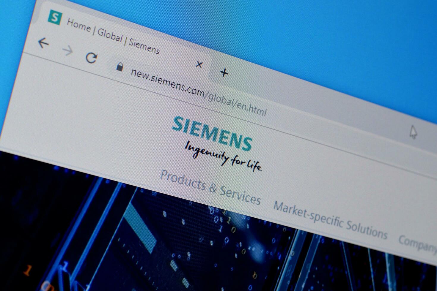 Homepage of siemens website on the display of PC, url - siemens.com. photo