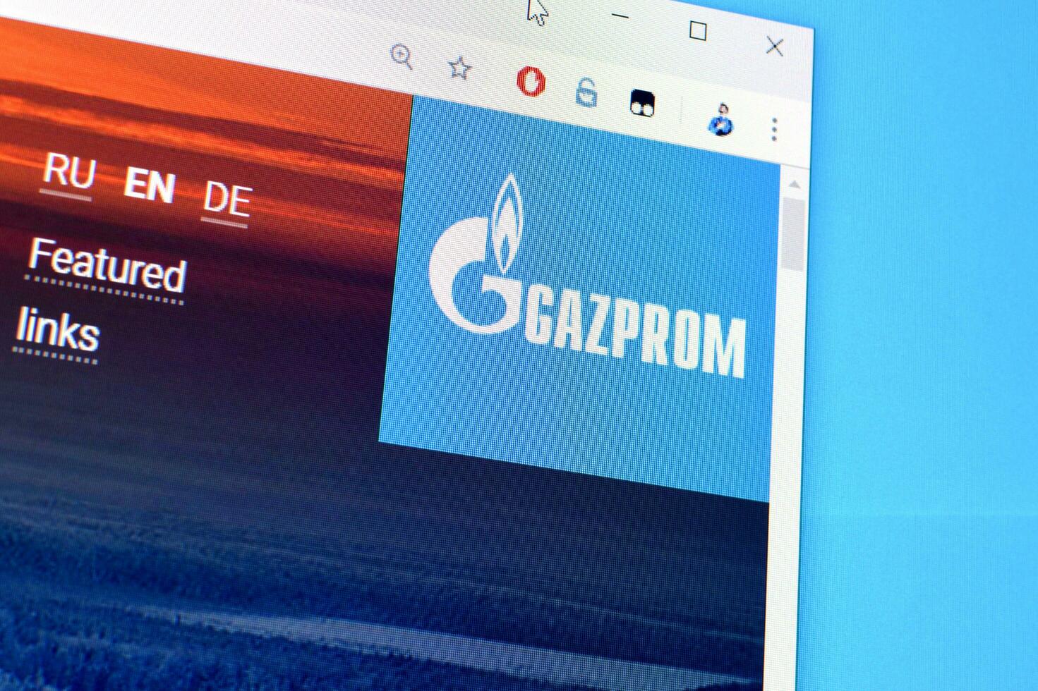 Homepage of gazprom website on the display of PC, url - gazprom.com. photo