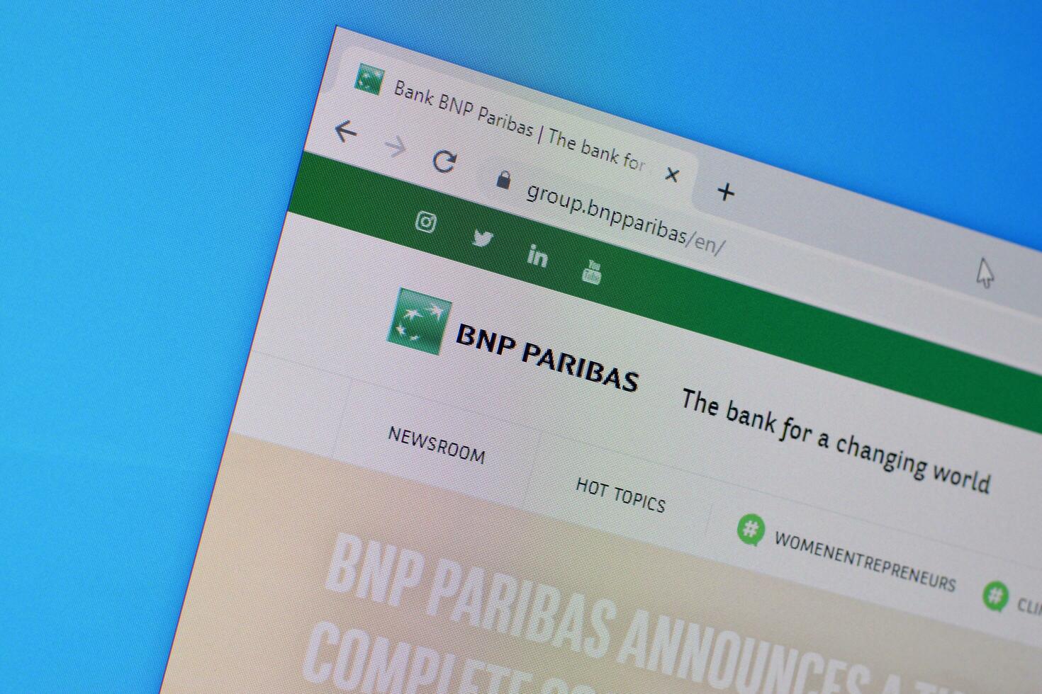Homepage of bnp paribas website on the display of PC, url - group.bnpparibas. photo