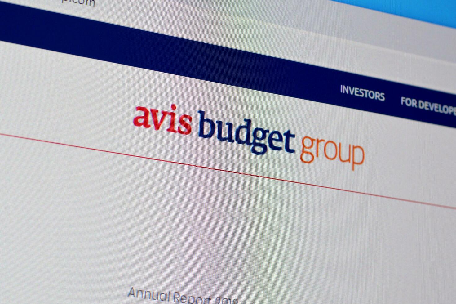 Homepage of avis budget group website on the display of PC, url - avisbudgetgroup.com. photo