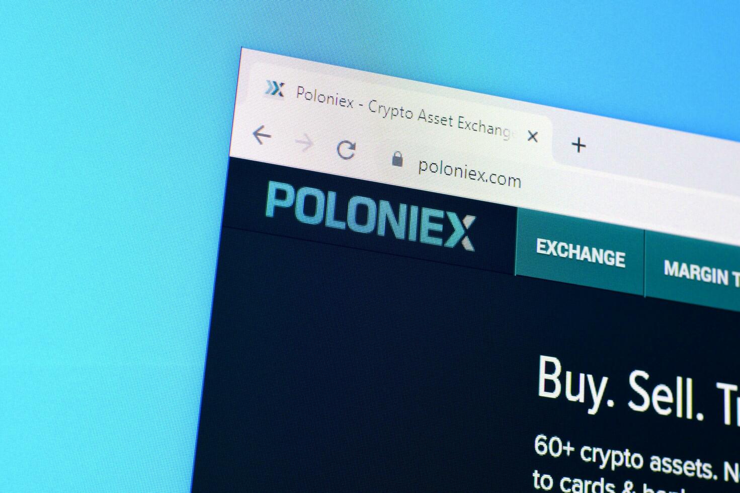 Homepage of poloniex website on the display of PC, url - poloniex.com. photo