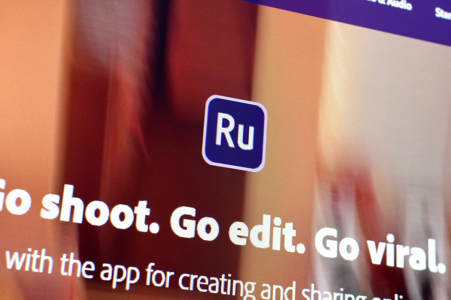 Web page of adobe premiere rush product on official website on the display of PC photo
