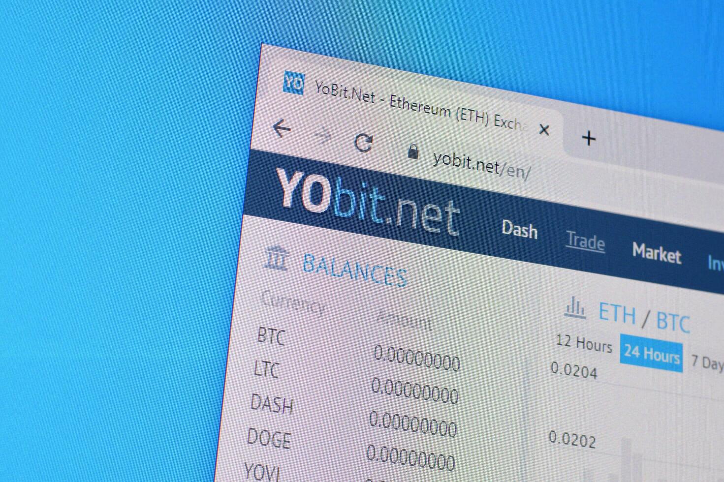 Homepage of yobit website on the display of PC, url - yobit.net. photo