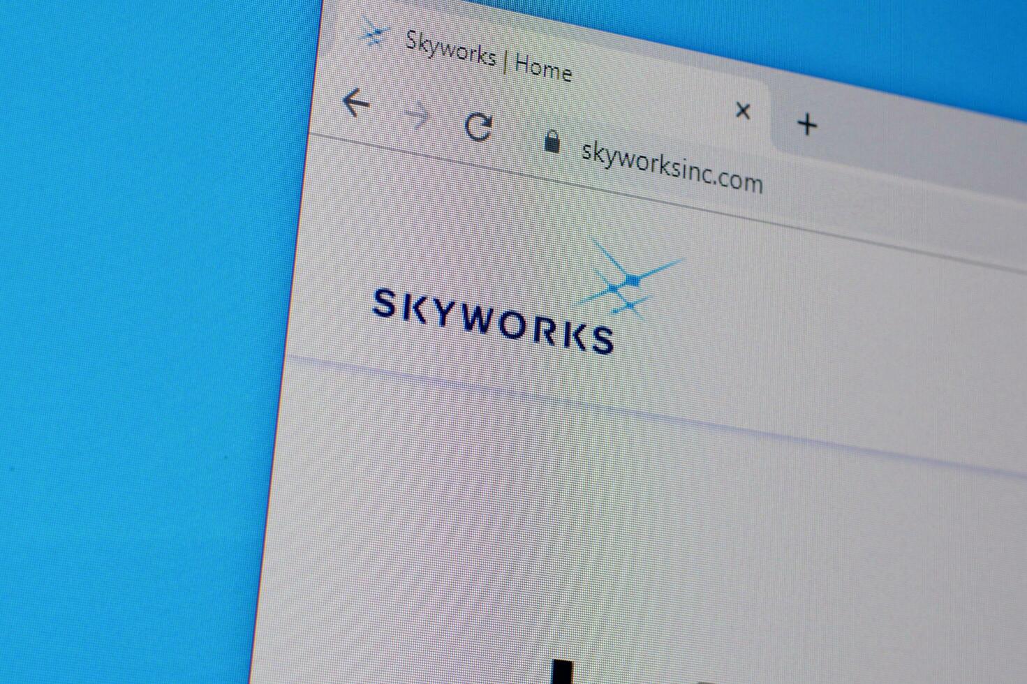 Homepage of skyworks inc website on the display of PC, url - skyworksinc.com. photo