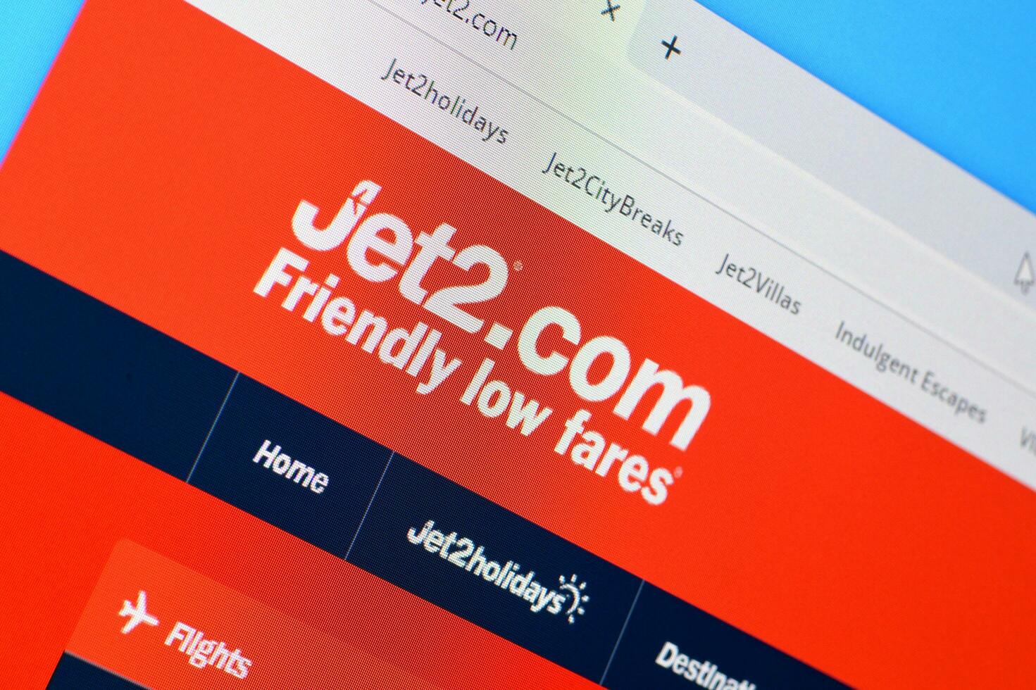 Homepage of jet2 website on the display of PC, url - jet2.com. photo