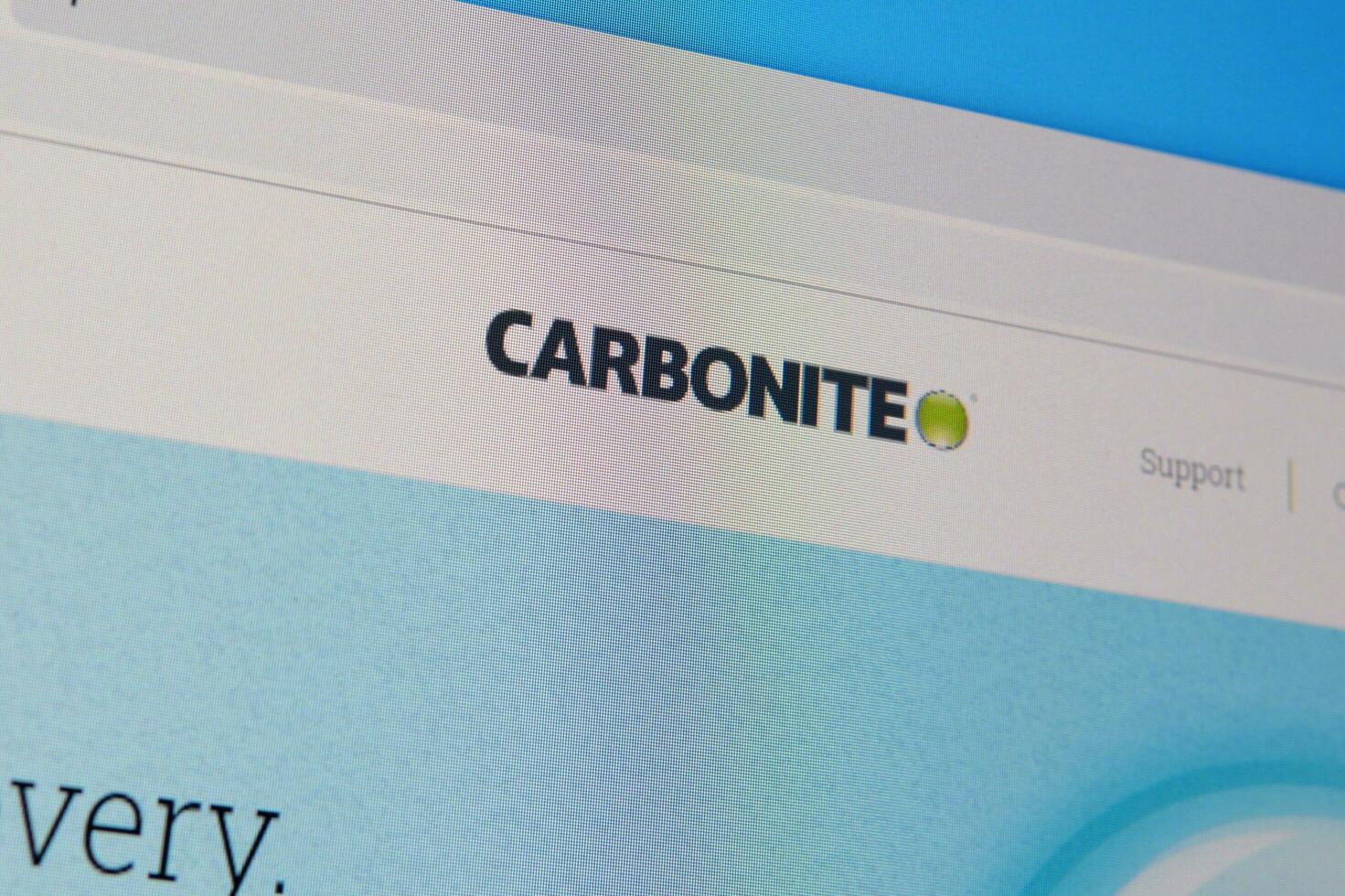 Homepage of carbonite website on the display of PC, url - carbonite.com. photo