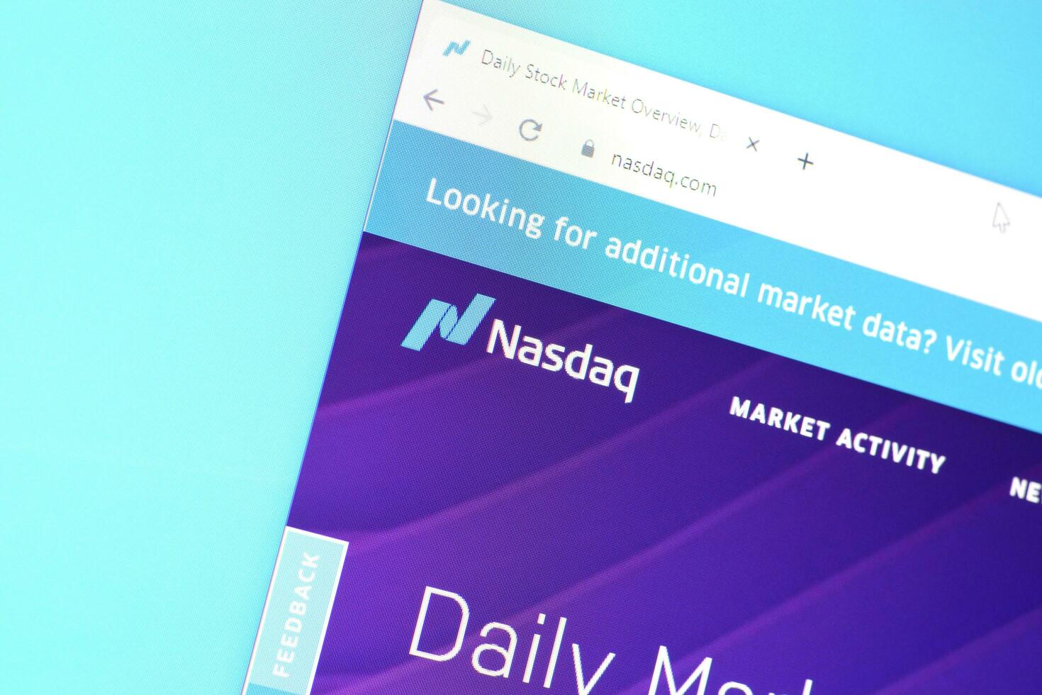 Homepage of nasdaq website on the display of PC, url - business.nasdaq.com. photo