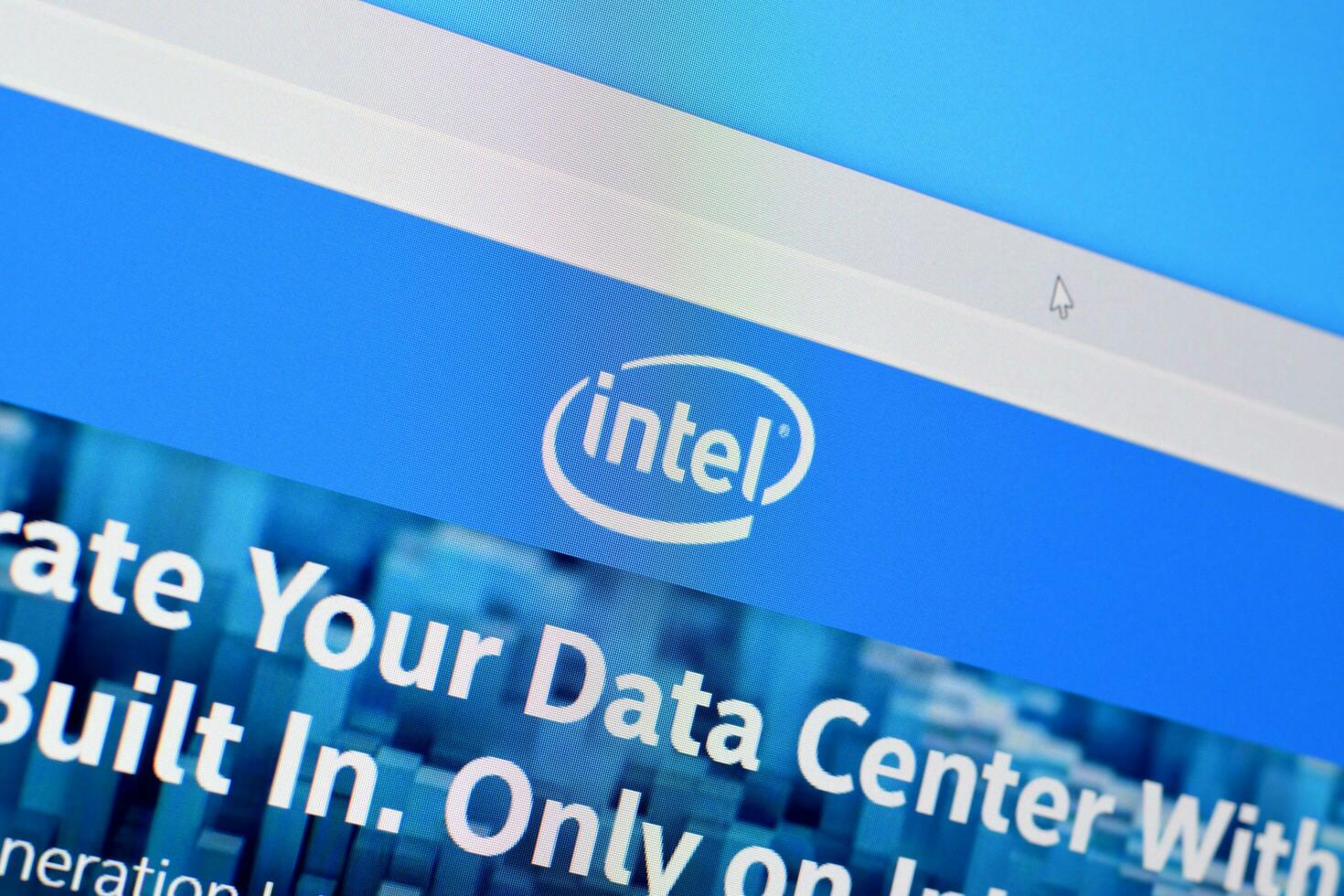 Homepage of intel website on the display of PC, url - intel.com. photo