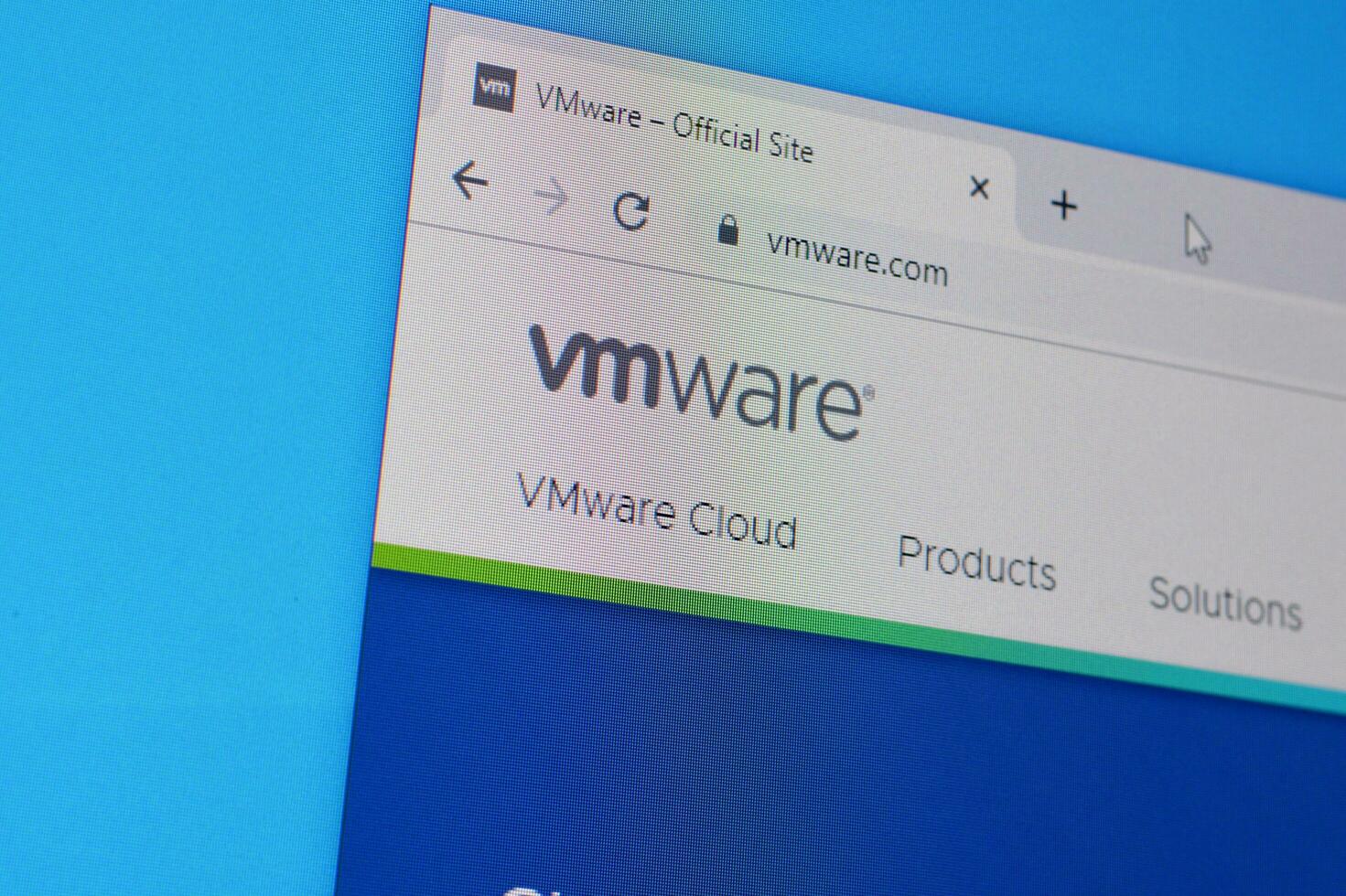 Homepage of vmware website on the display of PC, url - vmware.com. photo