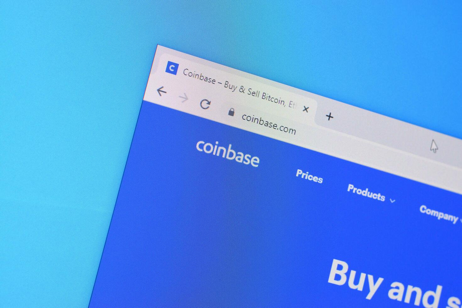 Homepage of coinbase website on the display of PC, url - coinbase.com. photo