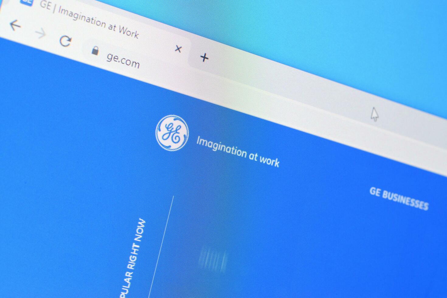 Homepage of ge t and d website on the display of PC, url - ge.com. photo