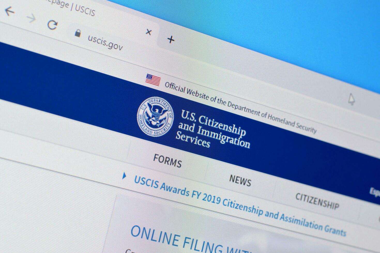 Homepage of uscis website on the display of PC, url - uscis.gov. photo